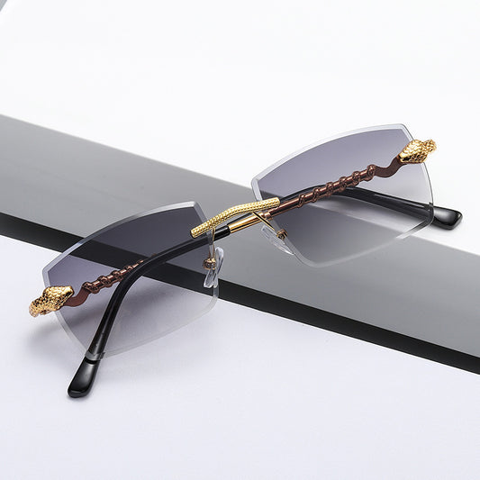 Lunettes serpent futuristes en cadre doré